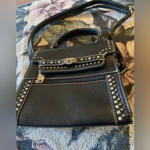 This is a P&G PURSE can use crossbdy/shldr/handhld.